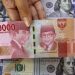 Rupiah Terus Melemah, Dolar AS Hampir Menyentuh Rp18.200