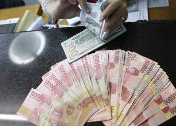 Rupiah Hari Ini Turun terhadap Dolar AS akibat Tarif Impor Trump