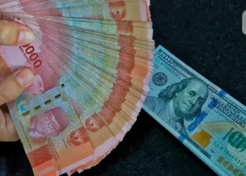 Rupiah Melemah Dekati 18000 per Dolar AS dan Penyebabnya menurut Analis