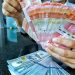 Rupiah Sentuh 18.184 per Dolar AS, Apakah Pemegang Valas Akan Menukar?