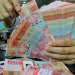 Rupiah Menembus 18000 per Dolar AS, BI Tingkatkan Intervensi Pasar Valas