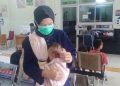 Tangis Bayi Aisya Saat Berebut Udara Segar di Tengah Asap Pekat Palembang